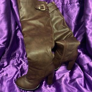 Brown knee high heeled boots